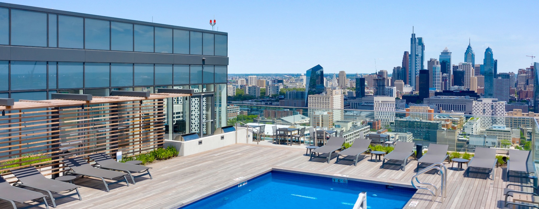 rooftop pool, lounge and grill area